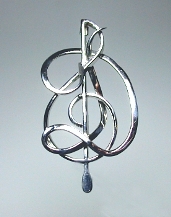 Sterling silver pin with G clef, baton and Initial D